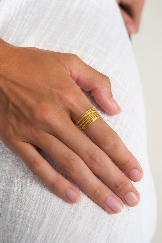 The Woven Cluster Ring
